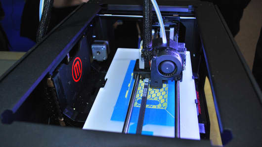 A MakerBot 3-D printer prints Nokia cellphone cases.